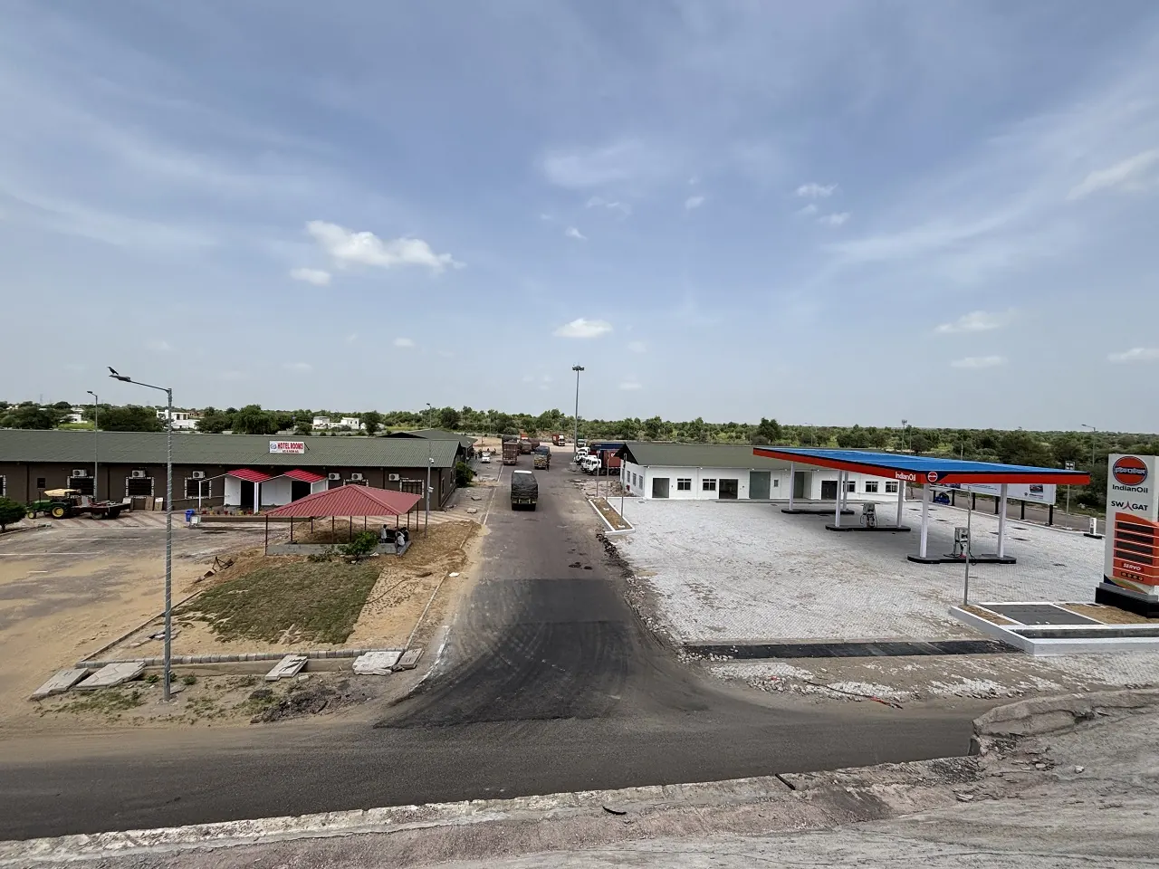 Free parking at Guru Kripa, Agolai, right off the Bharatmala Expressway